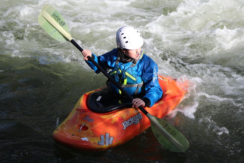 A kayaker, who was not officially competing in the Kayak Rodeo, takes turns visiting the Clear Creek water feature called "the rodeo hole" between competitors on June 22.